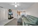 Spacious living room with tile floors leading to an eat-in kitchen and bright lighting at 6841 46Th N St, Pinellas Park, FL 33781