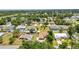 Expansive aerial view of single Gathering homes nestled in a serene residential community near lush landscaping at 78 Zenith St, Port Charlotte, FL 33954
