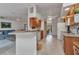 Open kitchen concept leading to a living area, and breakfast nook for seamless entertaining at 78 Zenith St, Port Charlotte, FL 33954