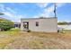 Exterior view of the storage shed, offering convenient space for tools and equipment at 78 Zenith St, Port Charlotte, FL 33954