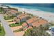Aerial view of condo complex with beach access on the beautiful Gulf Coast at 876 Golden Beach Blvd # 876, Venice, FL 34285