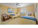 Cozy guest bedroom with twin beds and a relaxed coastal vibe at 876 Golden Beach Blvd # 876, Venice, FL 34285