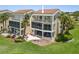 Spacious condo with screened lanais overlooking manicured lawn and tropical landscape in a beach community at 876 Golden Beach Blvd # 876, Venice, FL 34285