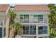 Coastal condo featuring balconies with white railings and views of the beach at 876 Golden Beach Blvd # 876, Venice, FL 34285