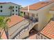 Exterior shot of the building with stairs leading to the unit at 876 Golden Beach Blvd # 876, Venice, FL 34285