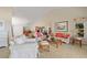 Open living space with vaulted ceilings, and combined dining and office area at 876 Golden Beach Blvd # 876, Venice, FL 34285