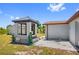Gazebo with screening and mature shade trees. Located in a backyard at 10517 Greenway Ave, Englewood, FL 34224