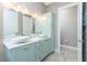 The bathroom features double sinks, lots of counter space and a separate water closet at 13284 Amaryllis Cir, Port Charlotte, FL 33981
