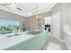 Well-appointed kitchen with a large island, stainless steel appliances, and seamless flow to the dining area at 13284 Amaryllis Cir, Port Charlotte, FL 33981