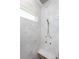 Modern tiled shower features dual shower heads and a built-in bench at 13284 Amaryllis Cir, Port Charlotte, FL 33981