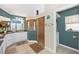 Well-appointed bathroom with dual sinks, granite countertops, and a glass-enclosed shower with tile at 13325 Ketridge Ave, Port Charlotte, FL 33953