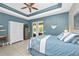 Comfortable main bedroom with unique ceiling design, fan, and access to a private outdoor space at 13325 Ketridge Ave, Port Charlotte, FL 33953
