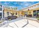 Outdoor patio features a hot tub, a bar, and a screen enclosure with ample seating space at 13325 Ketridge Ave, Port Charlotte, FL 33953