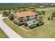 Aerial view highlighting the property's proximity to the ocean and lush surroundings, blending luxury and natural beauty at 16572 San Edmundo Rd # 111, Punta Gorda, FL 33955
