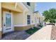 Exterior view of the home with beautiful brick pavers leading to the front door at 16572 San Edmundo Rd # 111, Punta Gorda, FL 33955