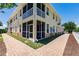 Attractive exterior with screened lanai and convenient pathways enhance curb appeal and outdoor living at 16572 San Edmundo Rd # 111, Punta Gorda, FL 33955