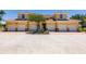 Attractive exterior view of home highlighting attached garages, and well-maintained landscaping at 16572 San Edmundo Rd # 111, Punta Gorda, FL 33955