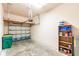 Spacious garage with storage shelving at 16572 San Edmundo Rd # 111, Punta Gorda, FL 33955