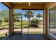 Enjoy the outdoors bug-free from this screened lanai with views of the lush landscaping and community at 16572 San Edmundo Rd # 111, Punta Gorda, FL 33955