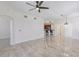 Open-concept living room with views of the kitchen, and bar stool seating at 16572 San Edmundo Rd # 111, Punta Gorda, FL 33955