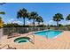 Relax by the pool and hot tub surrounded by lush landscaping creating a private and inviting retreat at 16572 San Edmundo Rd # 111, Punta Gorda, FL 33955