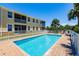 Enjoy the community pool with ample lounge space, creating a perfect spot for relaxation and recreation at 16572 San Edmundo Rd # 111, Punta Gorda, FL 33955