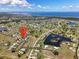 Panoramic aerial showcasing the community, nearby water features, and stunning coastal views at 17304 Vagabond Cir, Punta Gorda, FL 33955