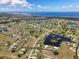 Panoramic aerial view of a beautiful waterfront community with lakes and canals and blue skies at 17304 Vagabond Cir, Punta Gorda, FL 33955