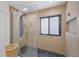 Modern bathroom with glass shower featuring neutral tiling and updated fixtures at 17304 Vagabond Cir, Punta Gorda, FL 33955