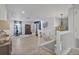 Bright living room featuring hardwood floors, white walls, decorative lights, and eye catching art at 17304 Vagabond Cir, Punta Gorda, FL 33955