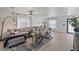 Bright living room offering a comfortable sectional sofa, stylish decor, and light wood flooring at 17304 Vagabond Cir, Punta Gorda, FL 33955