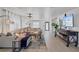 Comfortable living room featuring a plush sectional, stylish coffee table, and plenty of natural light at 17304 Vagabond Cir, Punta Gorda, FL 33955