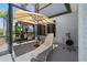Outdoor patio area with grill and outdoor lounge furniture at 17304 Vagabond Cir, Punta Gorda, FL 33955