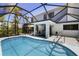 Inviting screened-in pool with ample seating area, perfect for relaxing and entertaining at 17304 Vagabond Cir, Punta Gorda, FL 33955