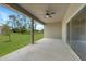 Back porch with a ceiling fan and a view of the backyard at 18503 Ellen Ave, Port Charlotte, FL 33948