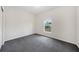 Bedroom with a single window, and neutral gray carpeting at 18503 Ellen Ave, Port Charlotte, FL 33948