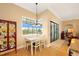 Cozy breakfast nook with a view of the water and a decorative china cabinet display at 19246 Moore Haven Ct, Port Charlotte, FL 33948