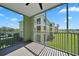 View of a screened balcony overlooking the grounds at 2160 Heron Lake Dr # 201, Punta Gorda, FL 33983