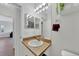 Bathroom featuring modern decor, a large mirror, a single sink vanity, and a shower with curtains at 2160 Heron Lake Dr # 201, Punta Gorda, FL 33983