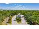 Scenic entrance to a gated community, featuring lush landscaping and a welcoming guardhouse at 2160 Heron Lake Dr # 201, Punta Gorda, FL 33983