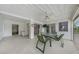 Enclosed patio offers a ceiling fan, tile flooring and multiple windows offering plenty of natural light at 2193 Beacon Dr, Port Charlotte, FL 33952