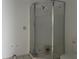 Bathroom featuring shower with glass enclosure and tiled flooring at 230 Waterway Cir Ne, Port Charlotte, FL 33952