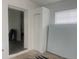 Room featuring an entrance, closet, and a window at 230 Waterway Cir Ne, Port Charlotte, FL 33952