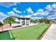Bocce ball court with a covered seating area, providing residents with a recreational space at 25100 Sandhill Blvd # F-203, Punta Gorda, FL 33983