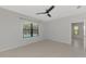 Bedroom with tile flooring and a view of the pool at 253 Marcheno Way, Nokomis, FL 34275
