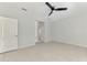 Bedroom with tile flooring and a view to the en suite bathroom at 253 Marcheno Way, Nokomis, FL 34275