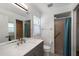 Updated bathroom with gray vanity and walk-in shower at 25449 Doredo Dr, Punta Gorda, FL 33955