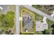 Drone shot displaying property lines, house orientation, yard size, and storage shed location at 2707 Auburn Blvd, Port Charlotte, FL 33948