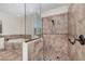 Beautiful bathroom featuring a walk-in shower with a rainfall showerhead and a large soaking tub at 2707 Auburn Blvd, Port Charlotte, FL 33948