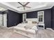 A spacious main bedroom boasts ample natural light and neutral tones, creating a serene and inviting retreat at 2707 Auburn Blvd, Port Charlotte, FL 33948